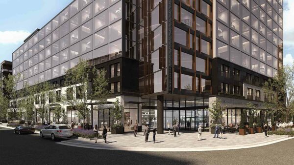 Rendering of Vineyard Station in Utah City with retail spaces and apartment tower.