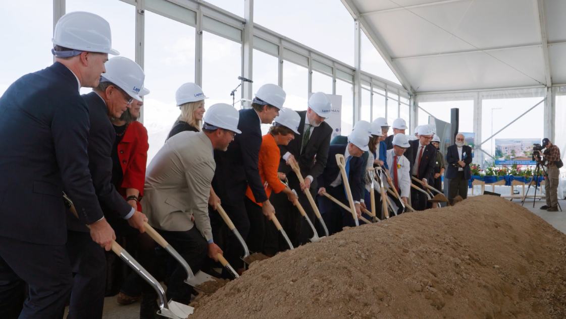 Ground Breaking with people placing shovels in dirt